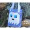 A cute ghost quilted on a large tote bag. Perfect for trick or treating .Extra pocket on the outside, lots of room on the inside for candy. 